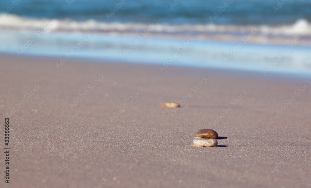 Pebbles on a beach with the southern ocean in the background Pebbles on a beach with the southern ocean in the background