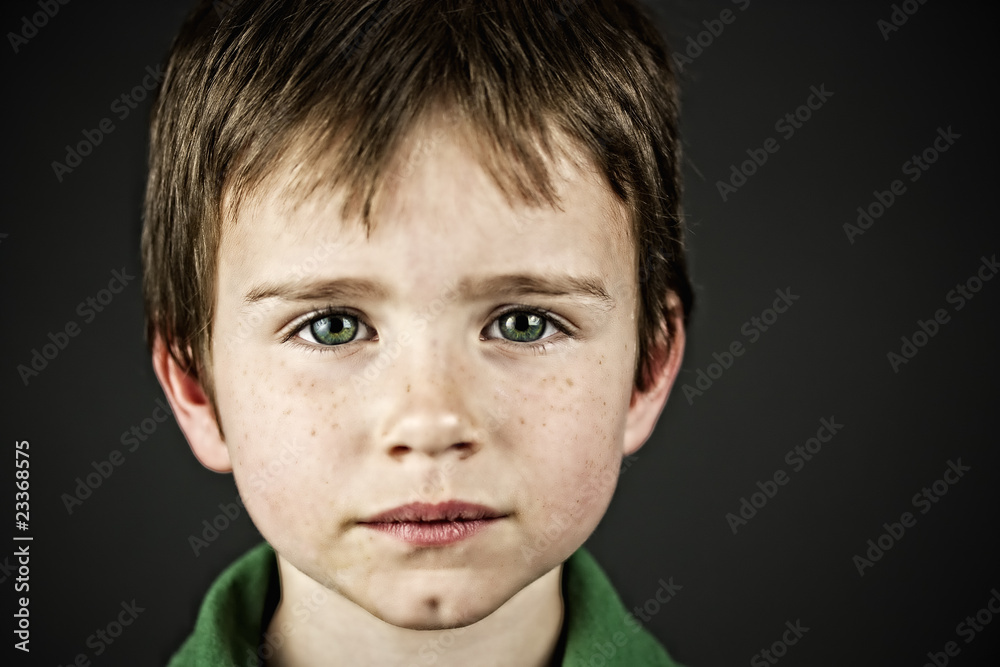 Boy with bright green eyes Boy with bright green eyes