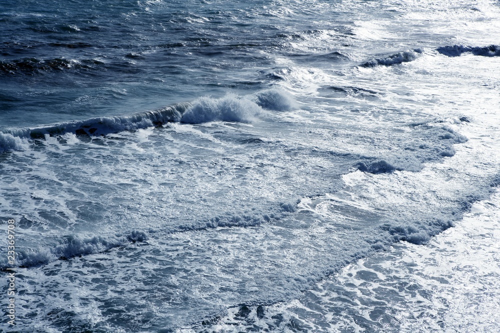 Blue sea ocean waves detail viewed from bird view