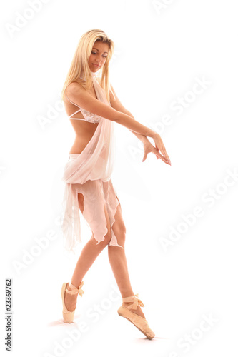 young and beautiful ballerina in white dress over white backgrou