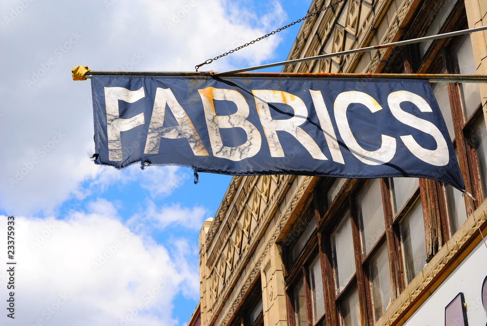 Fabrics Flag above Store