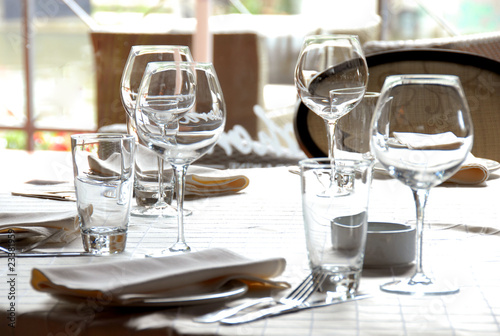 Glasses served on table in restaurant © Julija Sapic