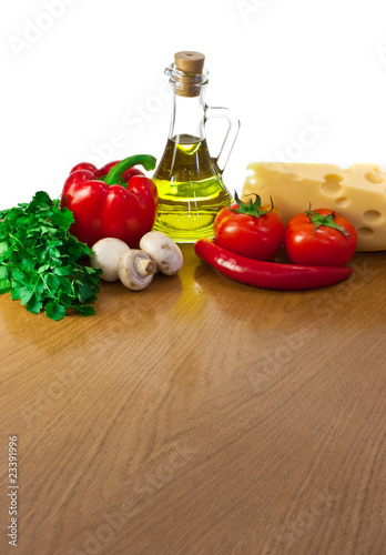 Empty table with ingredients and place for your dish or pizza