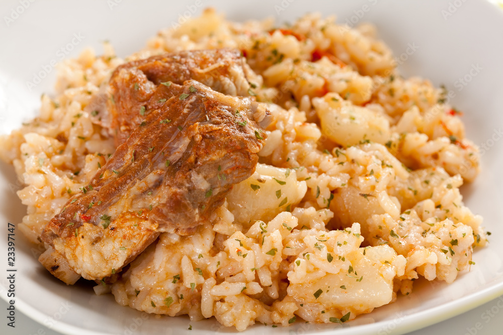rice dish with potatoes and pork chops rice dish with potatoes and pork chops