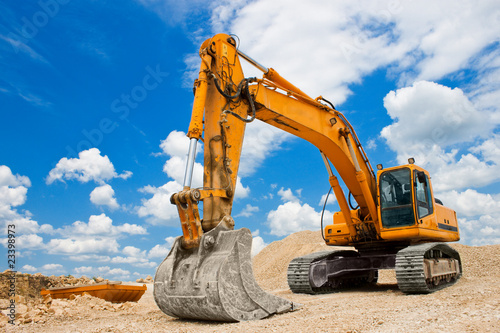Print op canvas Yellow Excavator at Construction Site