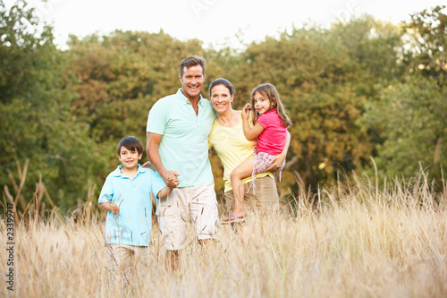 Family Enjoying Walk In Park