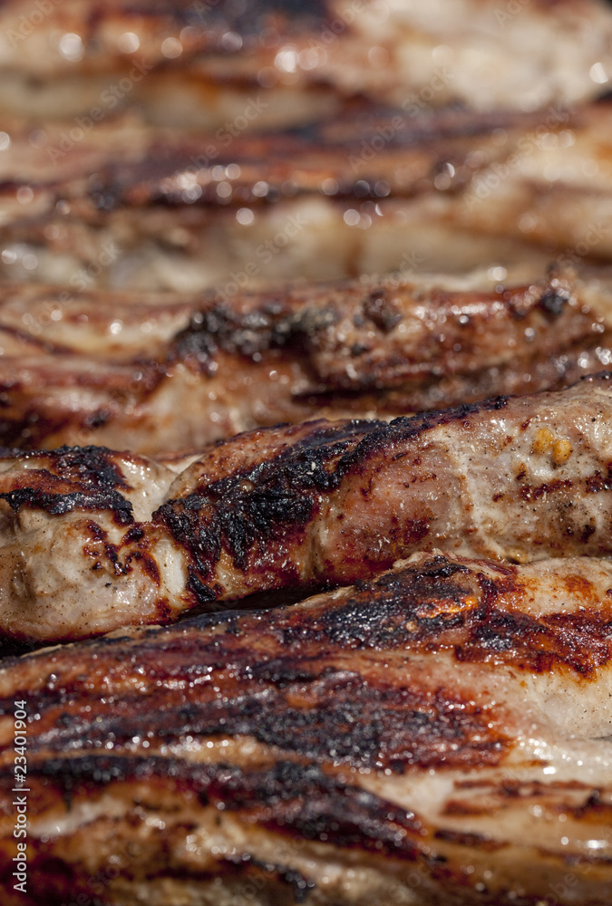 seasoned pork chops ribs on a bbq