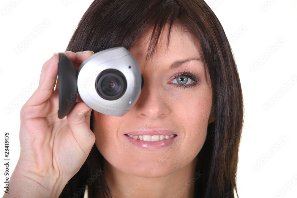 Portrait d'une jeune femme avec une webcam Portrait d'une jeune femme avec une webcam