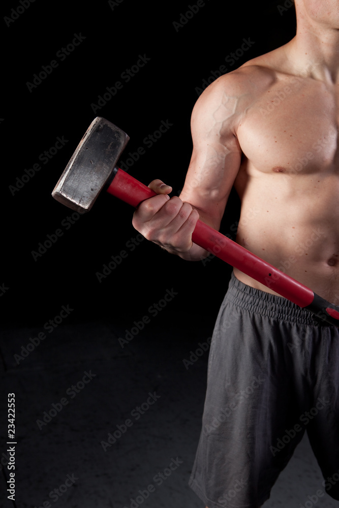 Shirtless guy holding a sledgehammer Stock Photo Adobe Stock