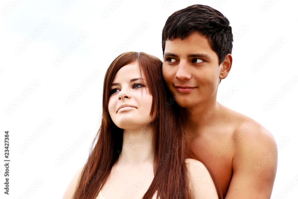 Happy young couple on the beach. Coffee and milk. Happy young couple on the beach. Coffee and milk.