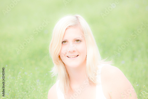 Beautiful young woman with  deliberate soft dreamy feel to image