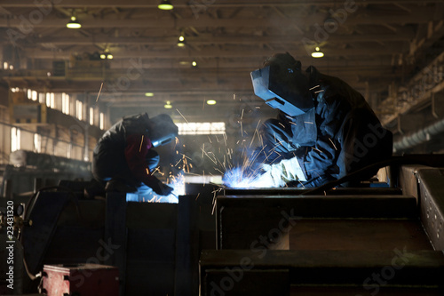 Two welders on job