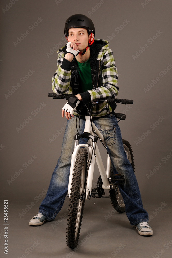 bicyclist on gray