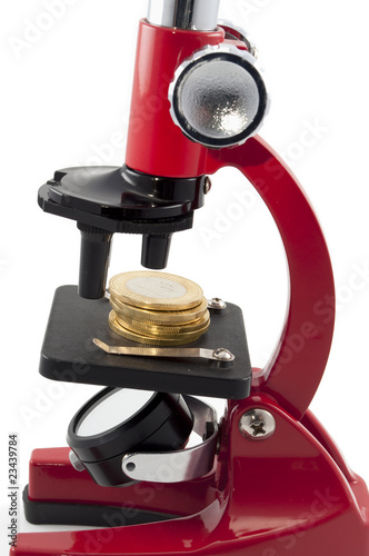 Coins and microscope