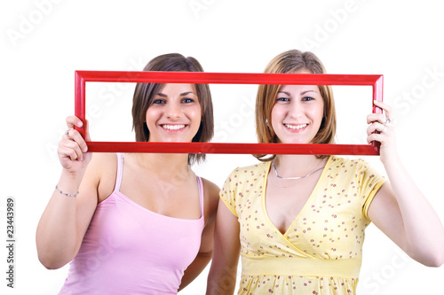 girls holding frame