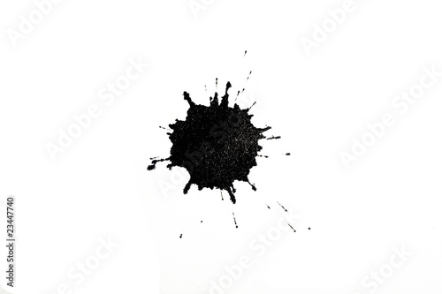black ink blot on white background