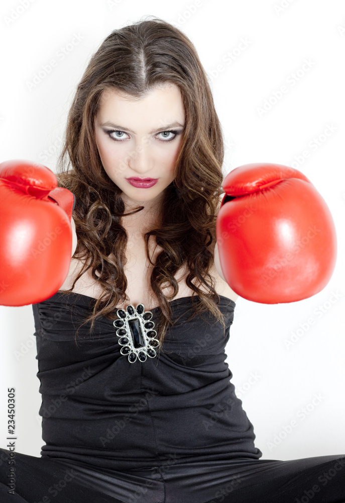 portrait of young woman with boxing gloves portrait of young woman with boxing gloves