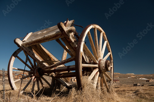 Abandoned horse cart photo