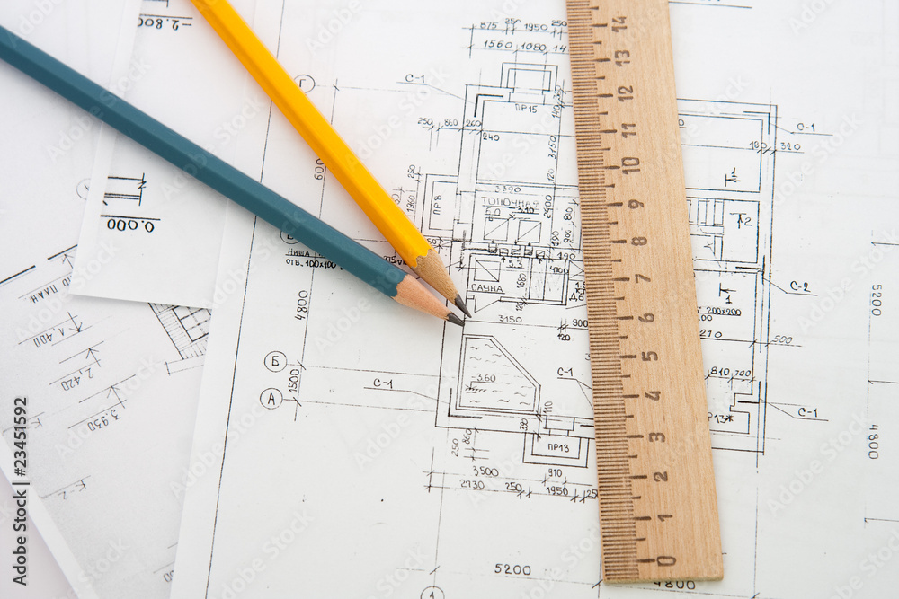 Architectural plans and blueprints in office Architectural plans and blueprints in office