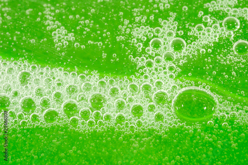 Green bath soap with bubbles