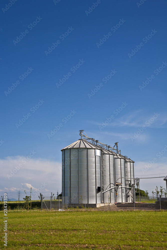 beautiful silver silos in landscape beautiful silver silos in landscape