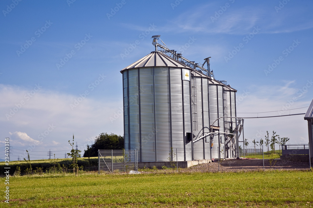 beautiful silver silos in landscape beautiful silver silos in landscape