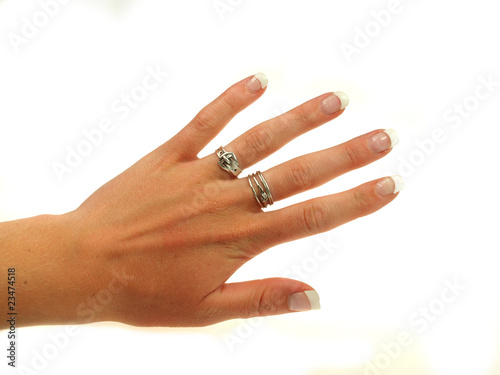 Young woman  s hand isolated on white background