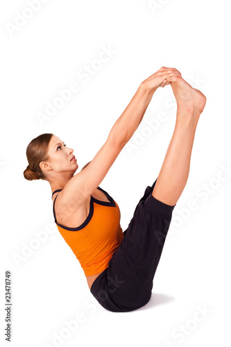 Woman doing Both Big Toes Yoga Exercise © Artur Bogacki
