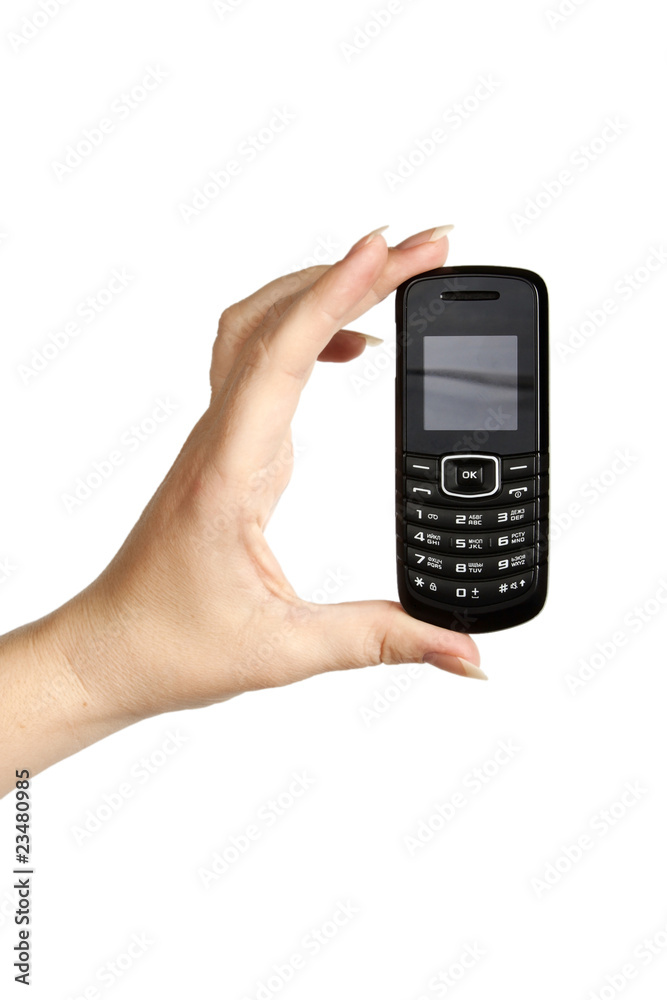 Slim mobile phone in the women's hand Slim mobile phone in the women's hand