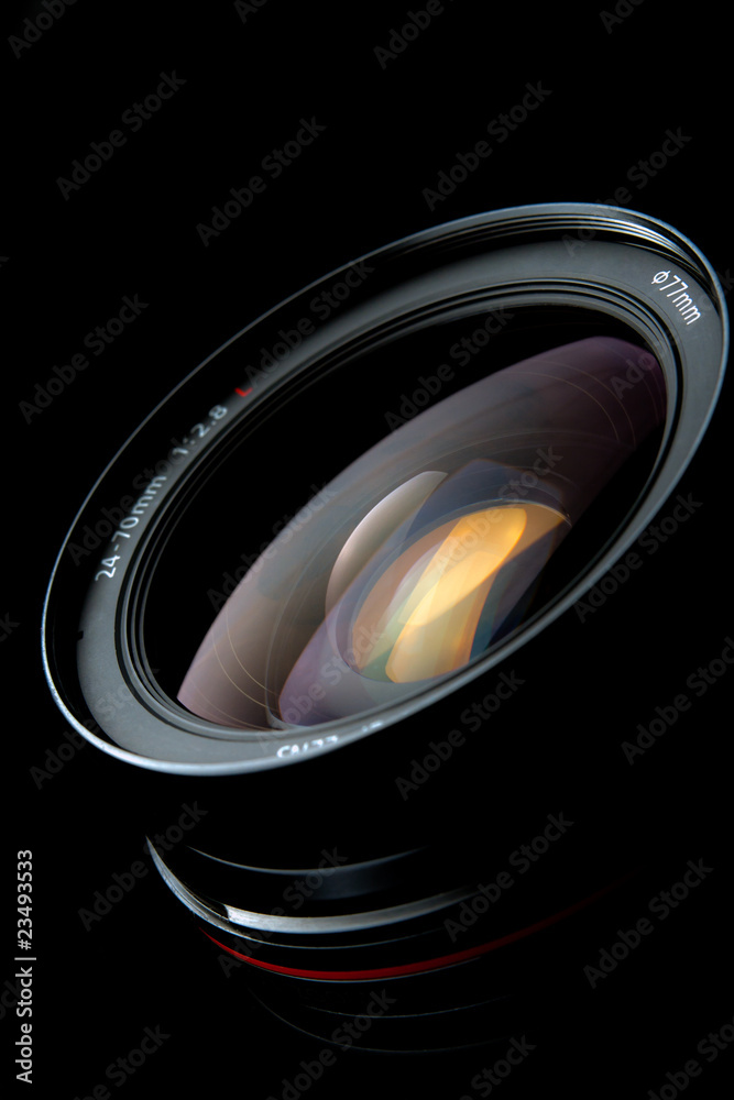 Photo lens with reflections on black background