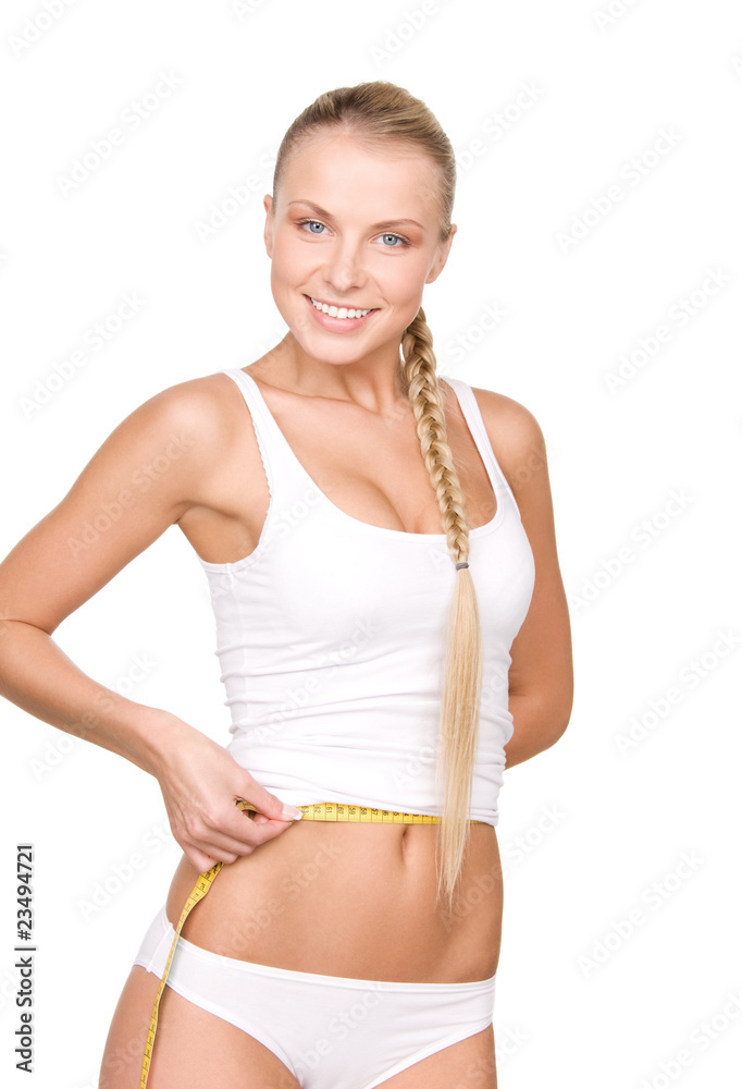 Obraz premium beautiful woman with measure tape
