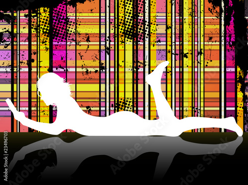 Silhouette of girl reading laying on the floor.