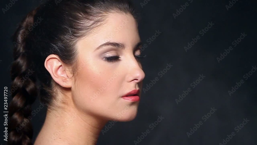 Beautiful young woman getting water breeze Beautiful young woman getting water breeze