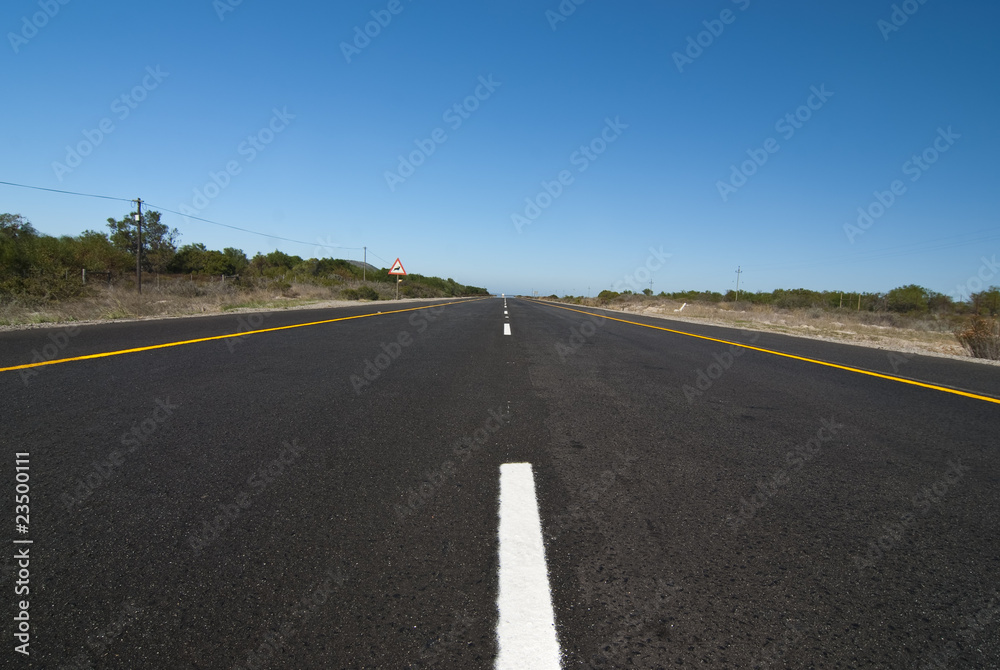 road with blue sky above