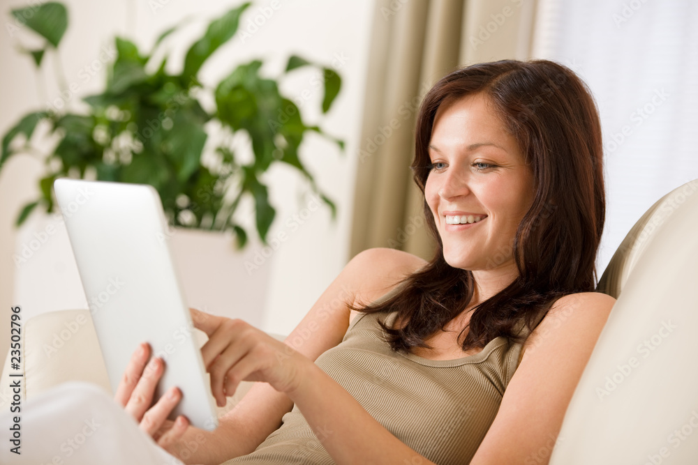 Woman with touch screen tablet computer Woman with touch screen tablet computer