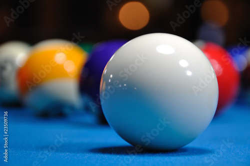Billiards - Cue ball with other colorful balls photo