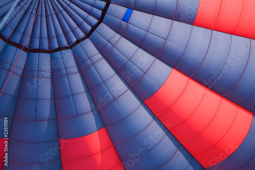 inside view of a red and dark blue hot air balloon;