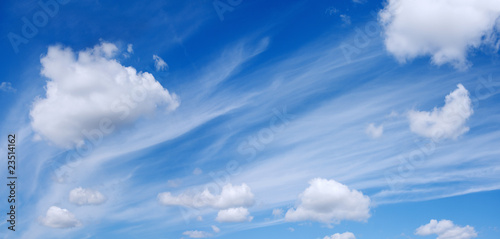 Beautiful white fluffy clouds in the blue sky