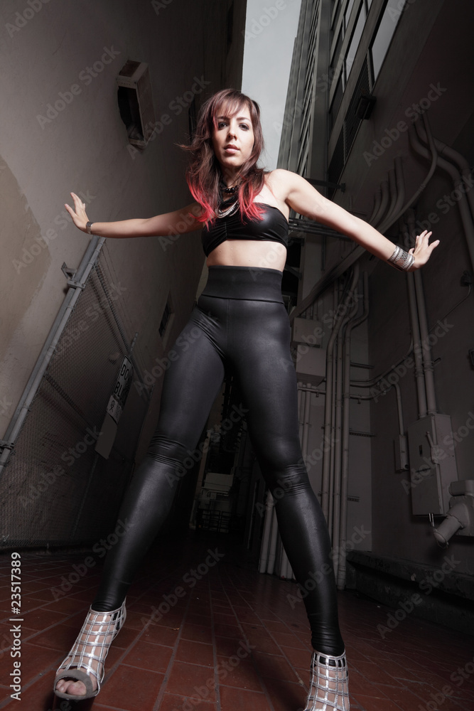 Punk glam rocker chick in the alley Punk glam rocker chick in the alley
