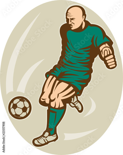 Soccer player kicking the ball front