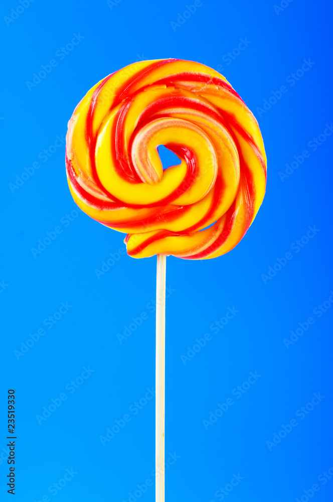 Colourful lollipop against the colourful background