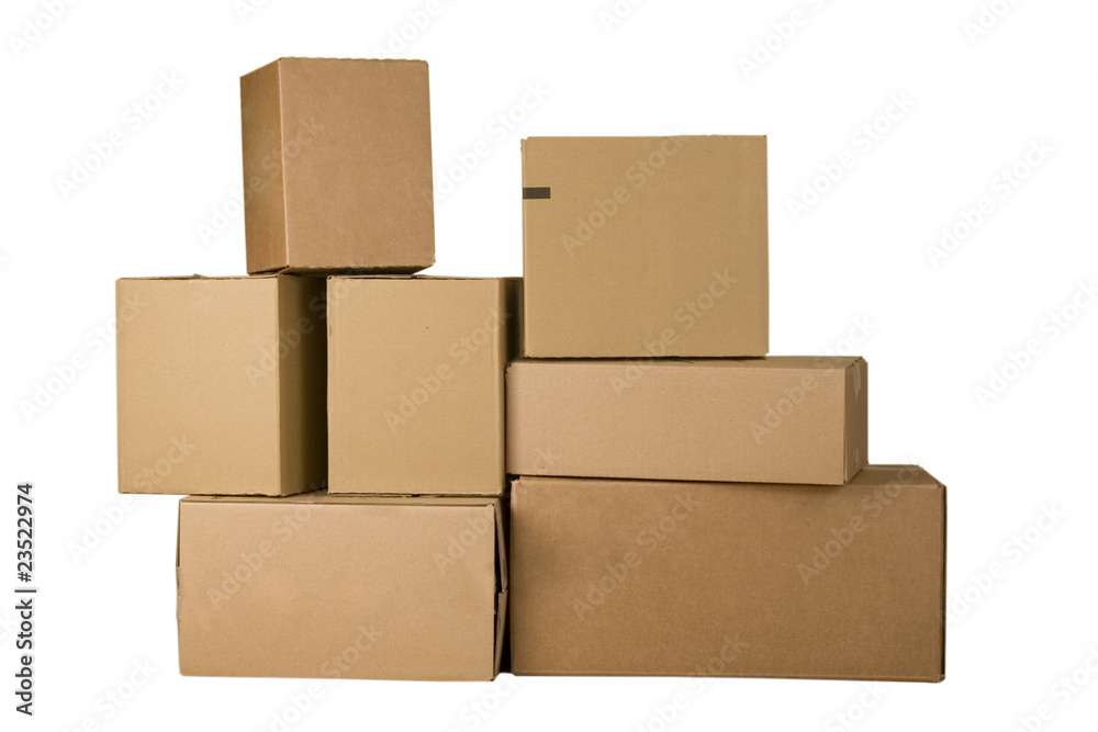 Brown cardboard boxes arranged in stack Brown cardboard boxes arranged in stack