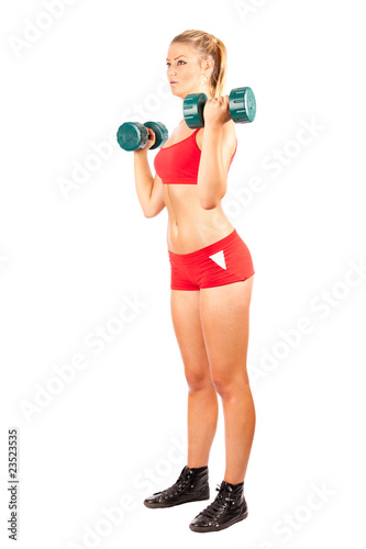 Woman doing fitness with weights