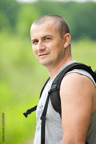 Man hiking into the woods