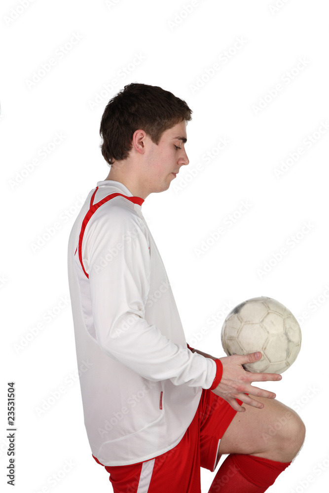 football player with ball. It is isolated. White background. football player with ball. It is isolated. White background.