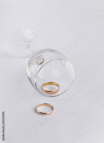 wedding rings in wine-glassw