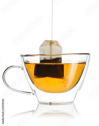 Teabag in the cup with hot water