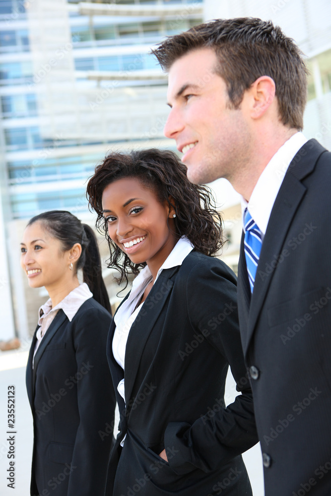A diverse attractive man and woman business team A diverse attractive man and woman business team