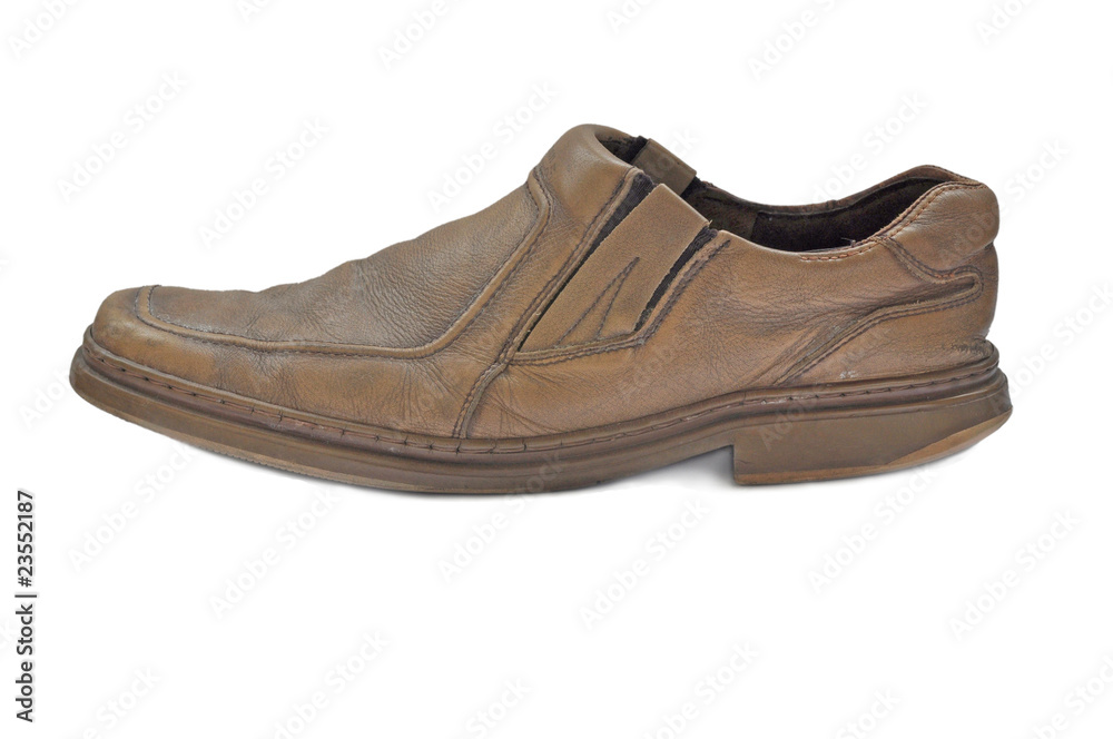 Old male shoe on white background