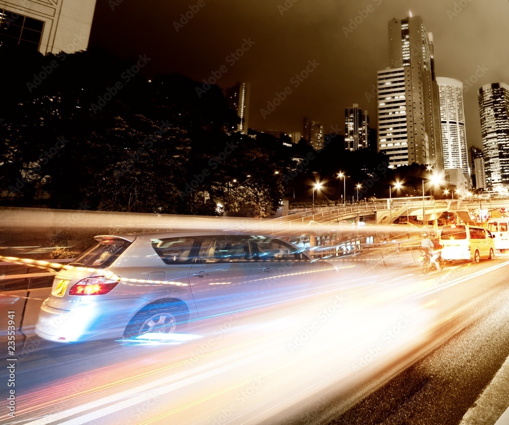 Obraz premium Fast moving cars at night